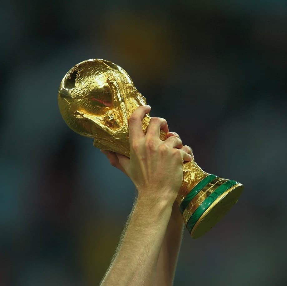 Athlete lifting the World Cup